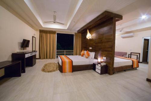 瓦拉姆普利酒店客房内的一张或多张床位