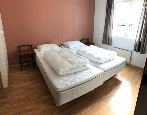Kaikanten Gryllefjord客房内的一张或多张床位