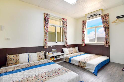 澎湖香亭民宿客房内的一张或多张床位