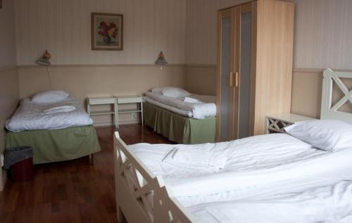 Pensionat Klåvasten客房内的一张或多张床位