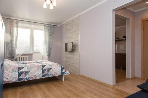 Счастливая квартира на Самарцева客房内的一张或多张床位