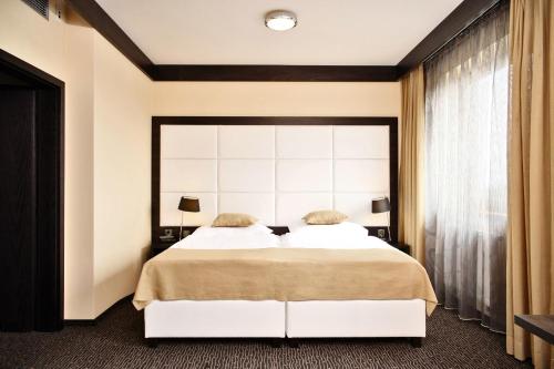 萨帕酒店客房内的一张或多张床位