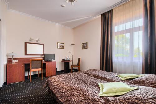 西塔斯卡酒店客房内的一张或多张床位