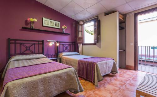 拉斯克鲁塞斯庭院酒店客房内的一张或多张床位