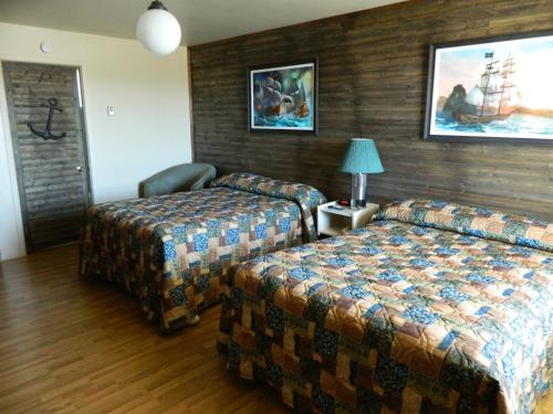 Motel & Camping Le Pirate客房内的一张或多张床位