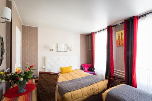 巴黎伏尔泰酒店客房内的一张或多张床位