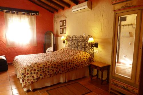 Casa Rural Crisol Spa客房内的一张或多张床位