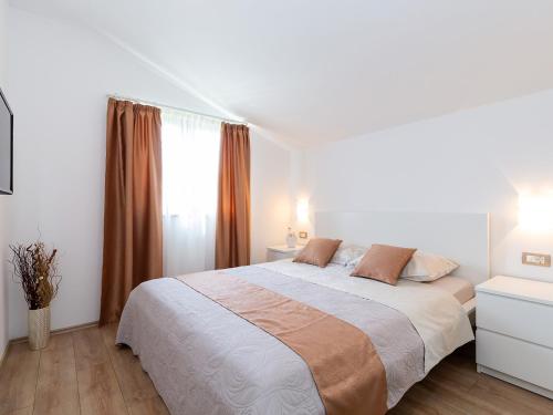 Apartments Gioia客房内的一张或多张床位