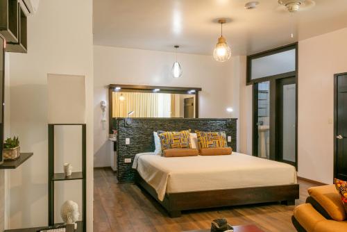 Ikala Galapagos Hotel客房内的一张或多张床位