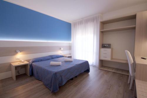 塞雷内拉酒店客房内的一张或多张床位