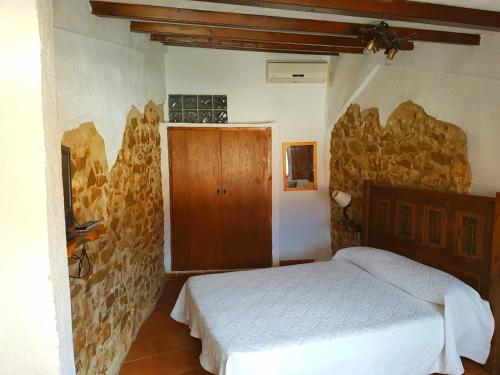 Casa rural el turmell客房内的一张或多张床位
