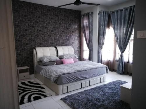 Arianna Homestay客房内的一张或多张床位