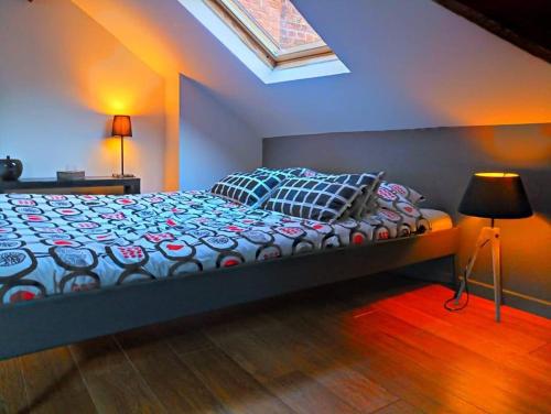 L'Entre ciel et Meuse客房内的一张或多张床位