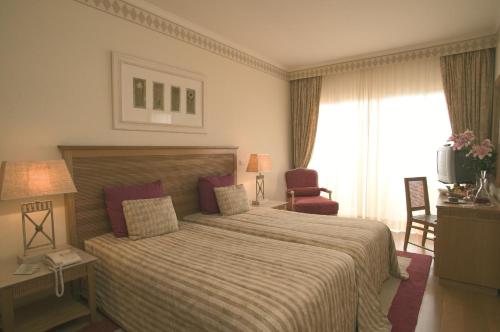 Quinta do Estreito客房内的一张或多张床位