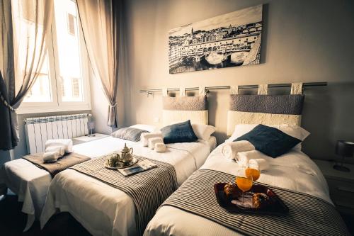 Silver Novella Luxury Apartment - Centro Storico客房内的一张或多张床位