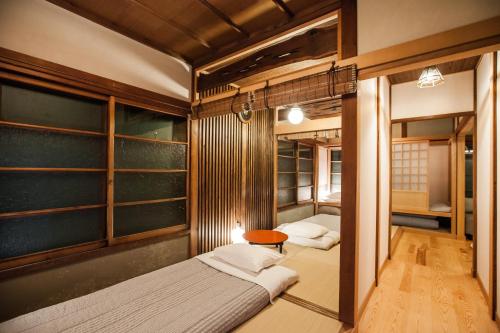 Araiya Tokyo -Private Townhouse-客房内的一张或多张床位