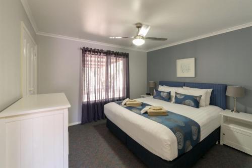 托柯玛塔度假酒店客房内的一张或多张床位
