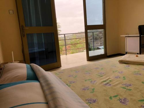 Mini Lalibela Guest House客房内的一张或多张床位
