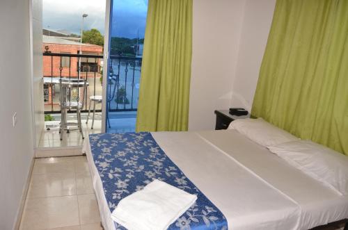 Hotel Bahía Cadi客房内的一张或多张床位