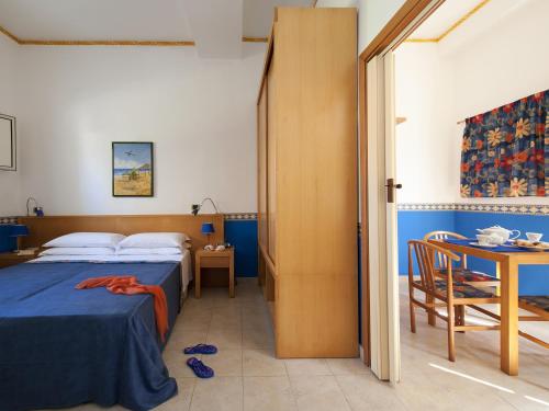 维拉吉奥阿尔伯格国际拉普拉加酒店客房内的一张或多张床位