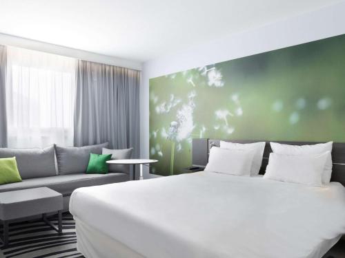 巴黎戴高乐机场诺富特酒店客房内的一张或多张床位