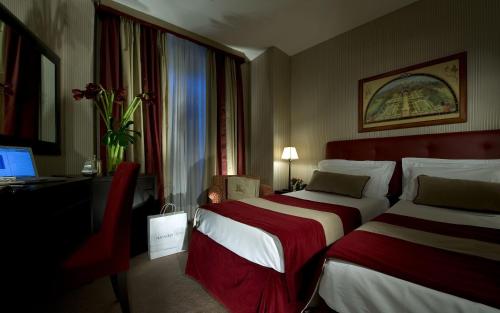 戴伯尔格洛尼酒店客房内的一张或多张床位