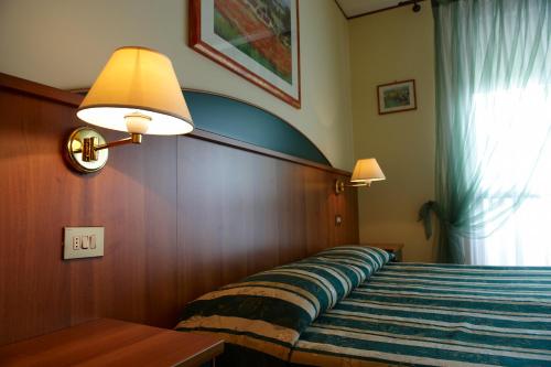 阿格里图里斯莫卡西纳里酒店客房内的一张或多张床位