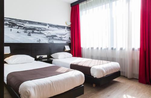 阿姆斯特丹机场贝斯韦斯特优质酒店客房内的一张或多张床位