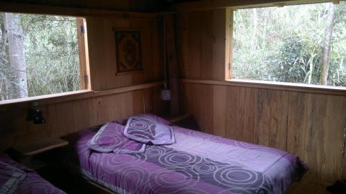 Rumi Wilco Ecolodge & Nature Reserve-Cabañas & Camping客房内的一张或多张床位