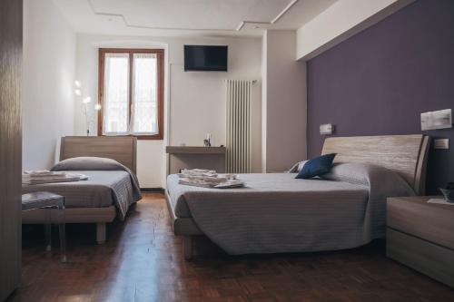Residenza al Castello客房内的一张或多张床位