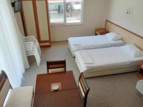 Sarıgerme Apart客房内的一张或多张床位