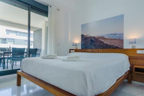 Apartamentos Bahía Blanca客房内的一张或多张床位