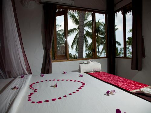 阿南凯拉别墅度假村客房内的一张或多张床位