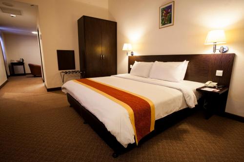 丹戎展望酒店客房内的一张或多张床位