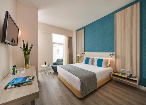 法罗酒店及海滩俱乐部客房内的一张或多张床位