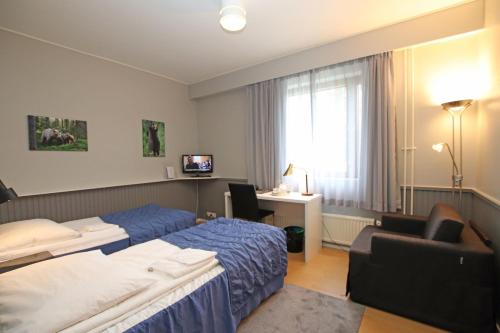 Hotelli Kainuu客房内的一张或多张床位