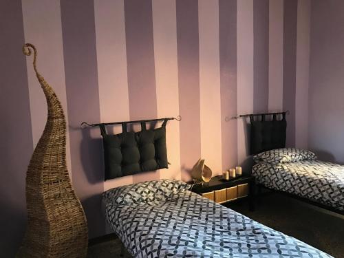 Appartamento Arcobaleno客房内的一张或多张床位