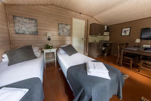 Santalahti Resort Cottages & Villas客房内的一张或多张床位