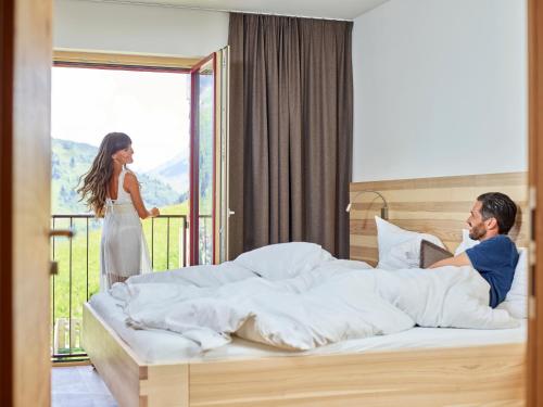 LechleitenResidenz Tirol的男男女女在旅馆带床的房间
