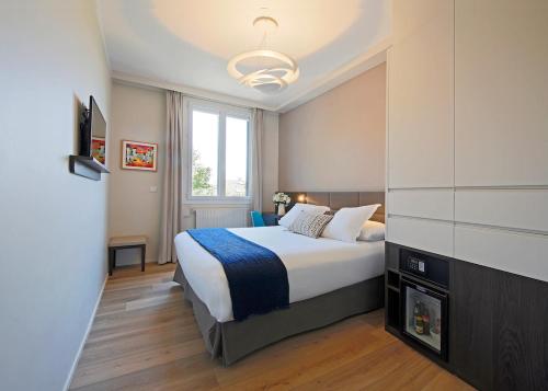 Negrecoste Hôtel & Spa客房内的一张或多张床位