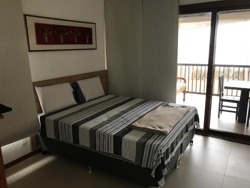 Bali Bahia Itacimirim客房内的一张或多张床位