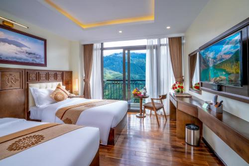 Sapa Relax Hotel & Spa客房内的一张或多张床位