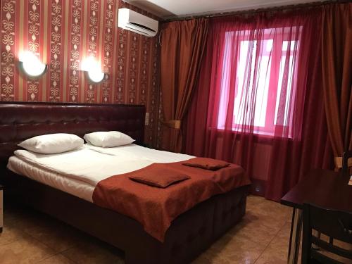 费立萨酒店客房内的一张或多张床位