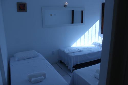 Hotel Pousada Catarina Mina客房内的一张或多张床位
