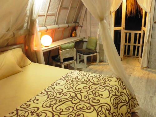 乌布乌玛南迪自然小屋客房内的一张或多张床位