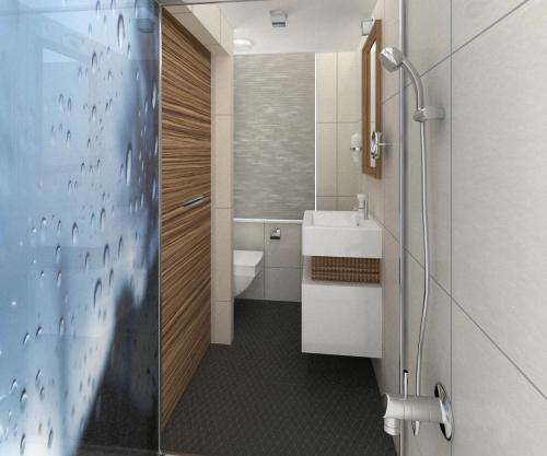 伊斯坦布尔亚尼波斯纳酒店的浴室配有卫生间、盥洗盆和淋浴。