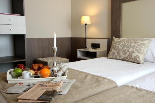 皮埃尔湾肯斯巴塞罗那酒店 客房内的一张或多张床位