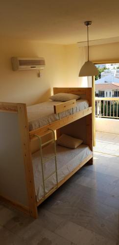 NEX Hostel客房内的一张或多张双层床