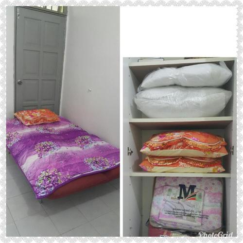 丹那美拉DIDIE HOMESTAY 1的两张带床和枕头的房间的照片