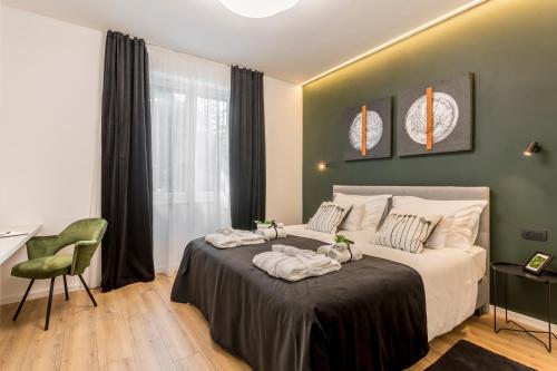 Monvi Luxury Suites客房内的一张或多张床位